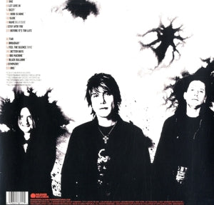 Greatest Hits Volume One - the Singles - .. One - the Singles - Back Cover