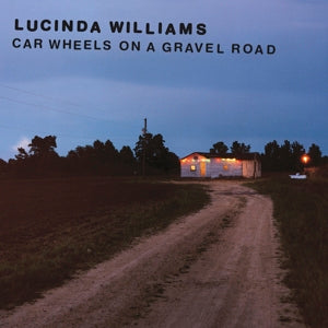 Car Wheels On a Gravel Road - Cover
